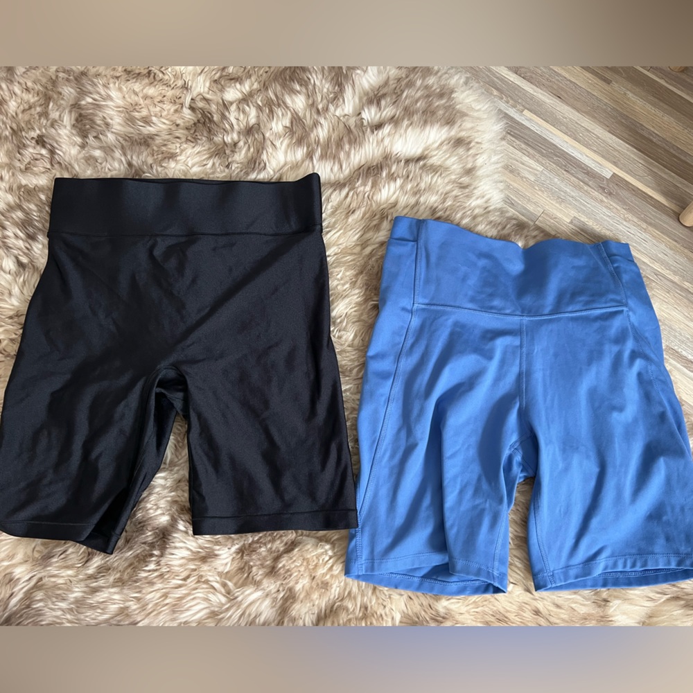 Biker shirt bundle! Both are size large, would fit a 10-14. Lots of stretch!